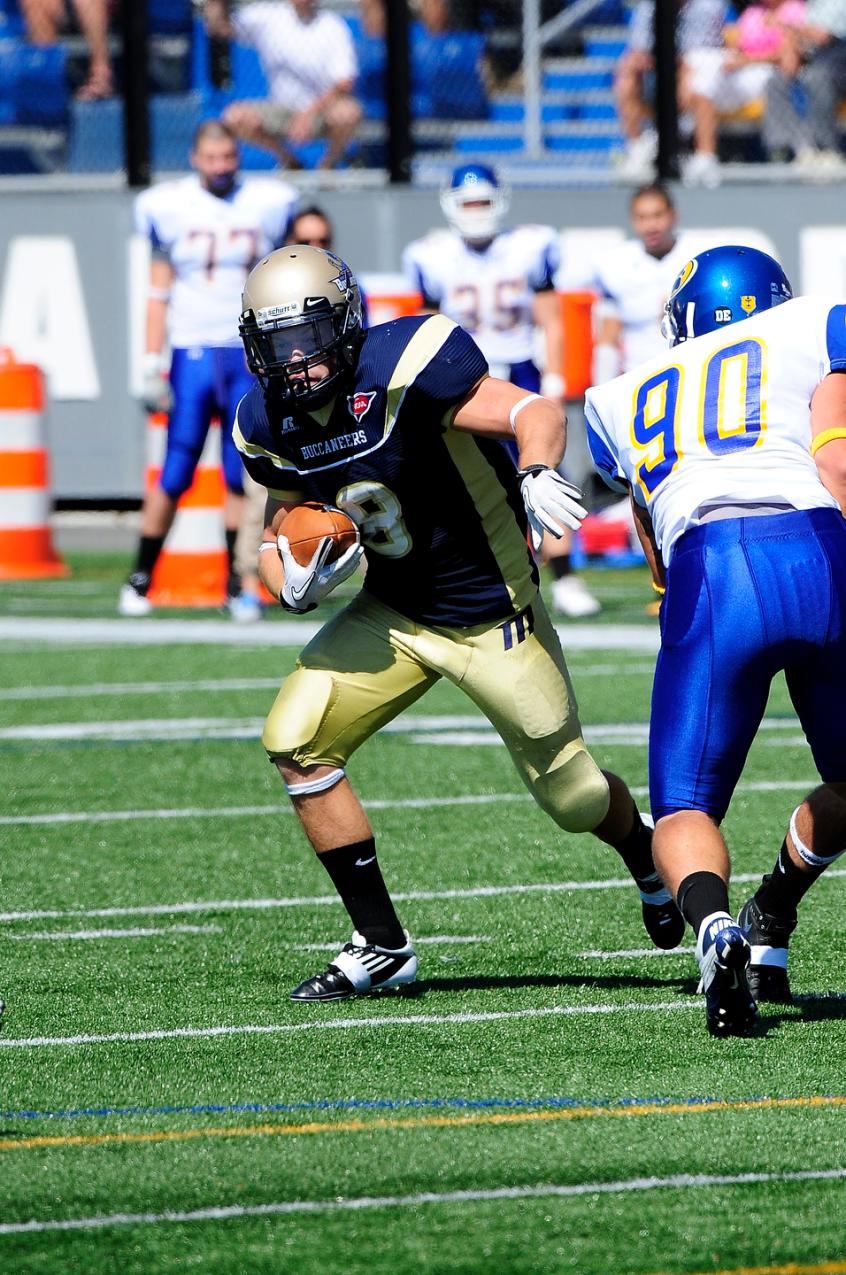 Robery Hauls In Pair Of Touchdown Receptions, Reopell, Caruso Visit End Zone As Football Drops 61-30 NEFC Bogan Opener At Coast Guard