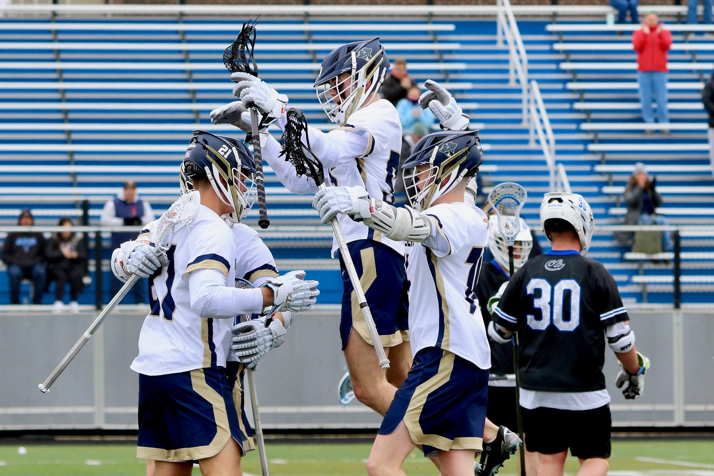 Bucs Pounce Wildcats in Season Opener